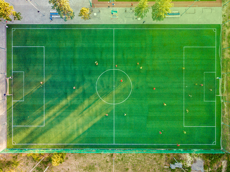 birds-eye view of soccer field with a game is session